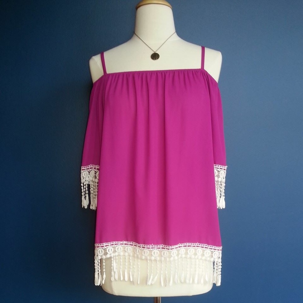 Fuschia top with crochet detail.